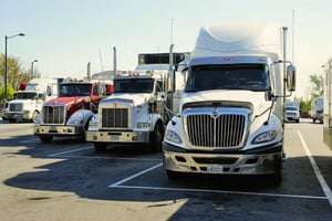 Freight trucks parked in a lot