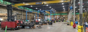 Sullivan Steel shop floor with saws and steel pull station